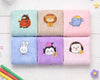 Set of six colorful hanky with cartoon animal designs on a white wooden surface.