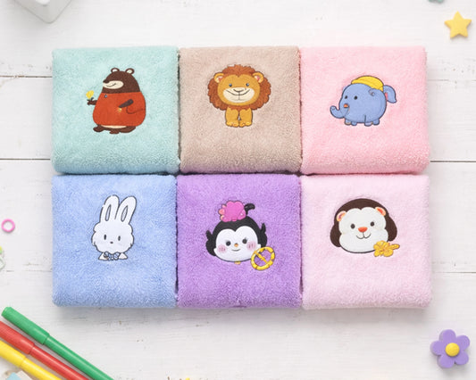 Set of six colorful hanky with cartoon animal designs on a white wooden surface.