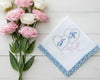 White cotton handkerchief for women showing a blue embroidered letter A with floral vine details and scalloped lace