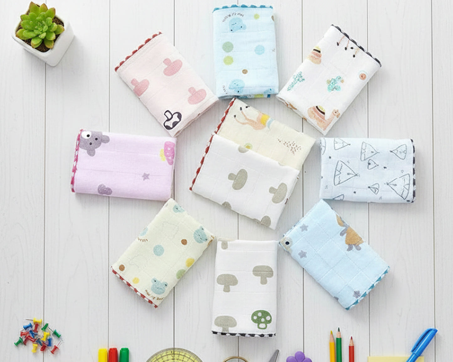 Soft multi layered cotton gauze face cloth for infants featuring whimsical desert and forest illustrations