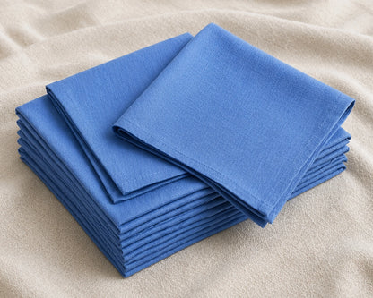 Stack of blue hanky on a beige surface