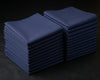 Stack of blue folded hanky on a dark background