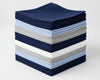Stack of blue hanky on a dark surface