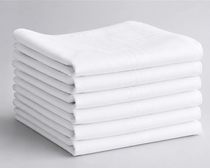 Stack of white folded hanky on a gray background