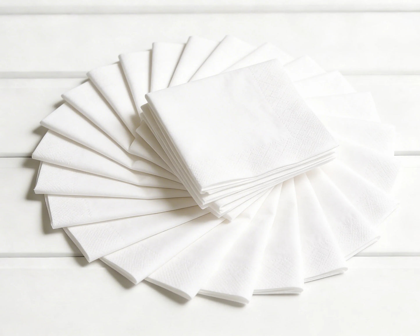 Stack of white hanky on a white background