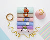 Stack of colorful microfiber cloths for kids with various animal friend illustrations