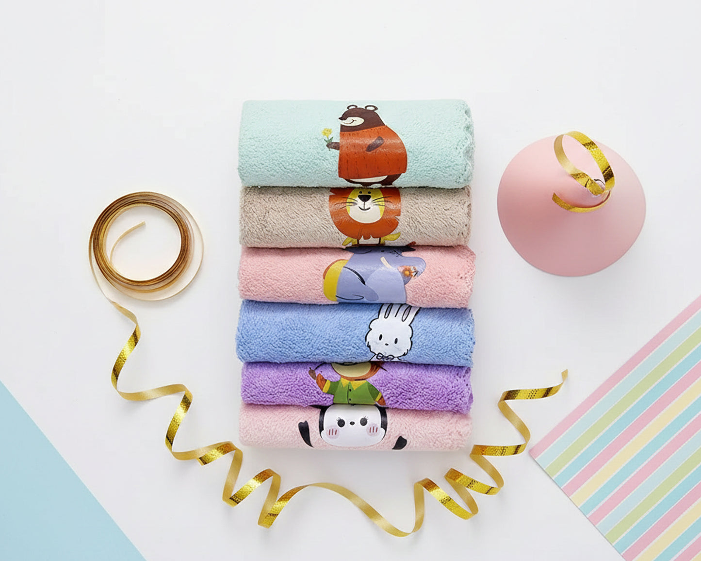 Stack of colorful microfiber cloths for kids with various animal friend illustrations