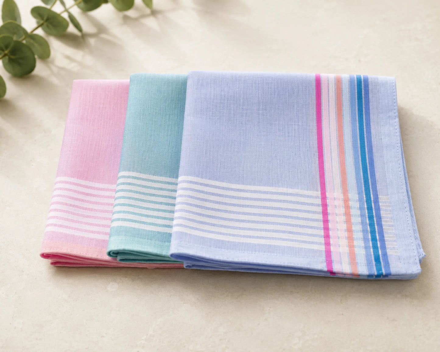 Three hanky with striped patterns on a light background