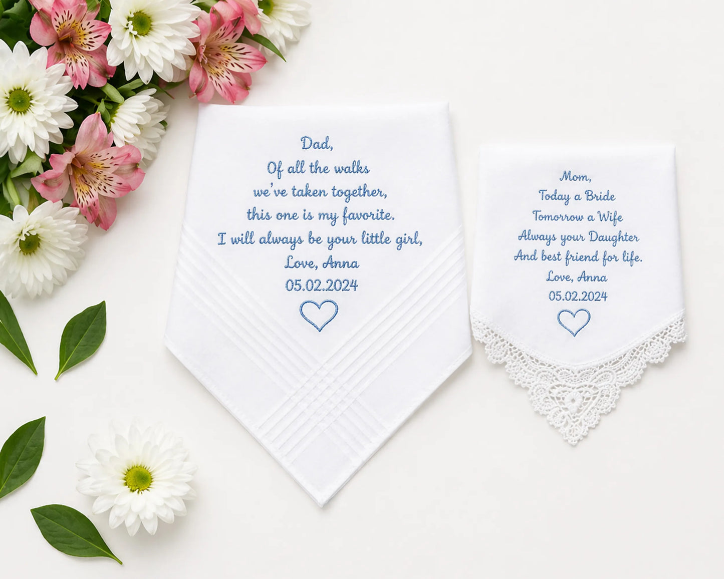 Two embroidered handkerchiefs with personalized text on a white background with flowers.