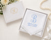 Wedding handkerchief with monogram 'B' and personalized text in a decorative box with flowers and pearls.