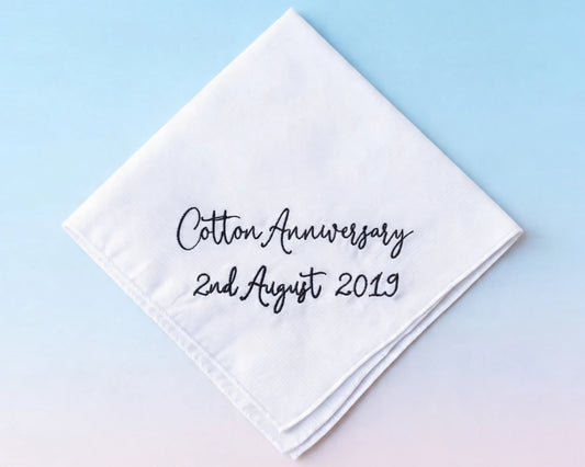 White handkerchief with 'Cotton Anniversary 2nd August 2019' text on a light blue background