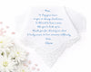 White handkerchief with embroidered text and flowers on a white background