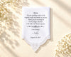 White hanky for mom on a table with a bottle and glass.