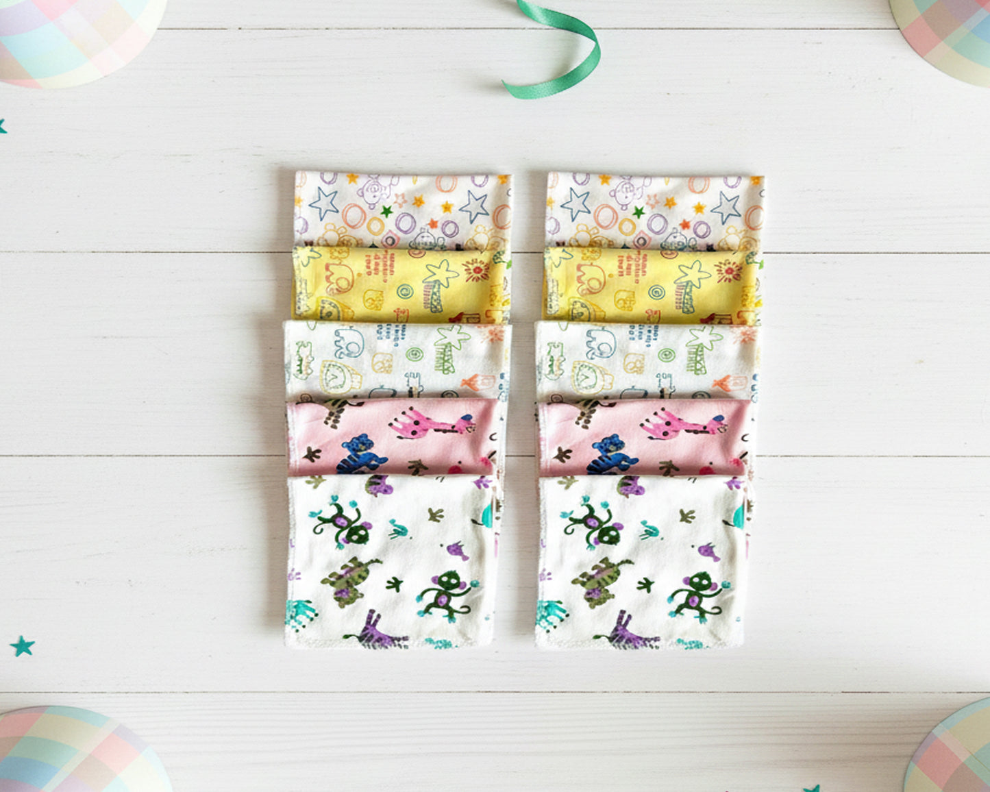 stack of folded cotton handkerchiefs with various character and pattern prints