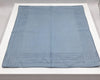 Blue textured fabric on a white background