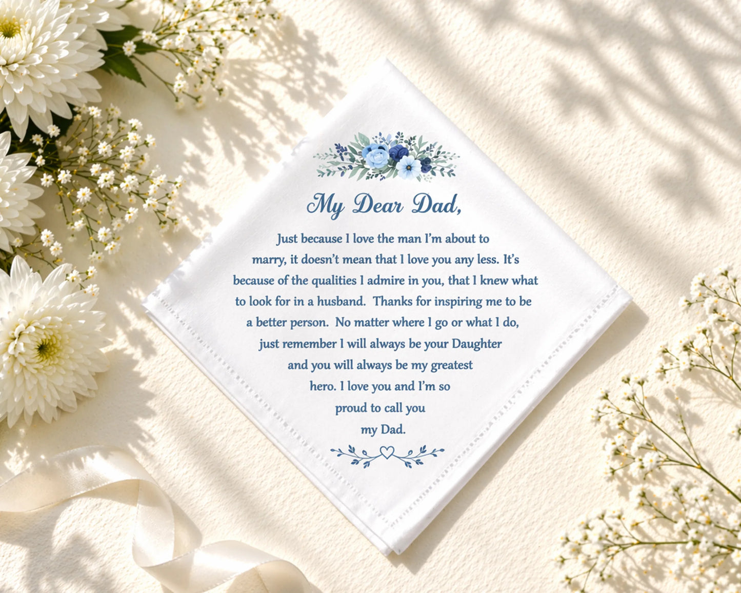 hanky for a father with a message of love and pride, surrounded by white flowers on a light background