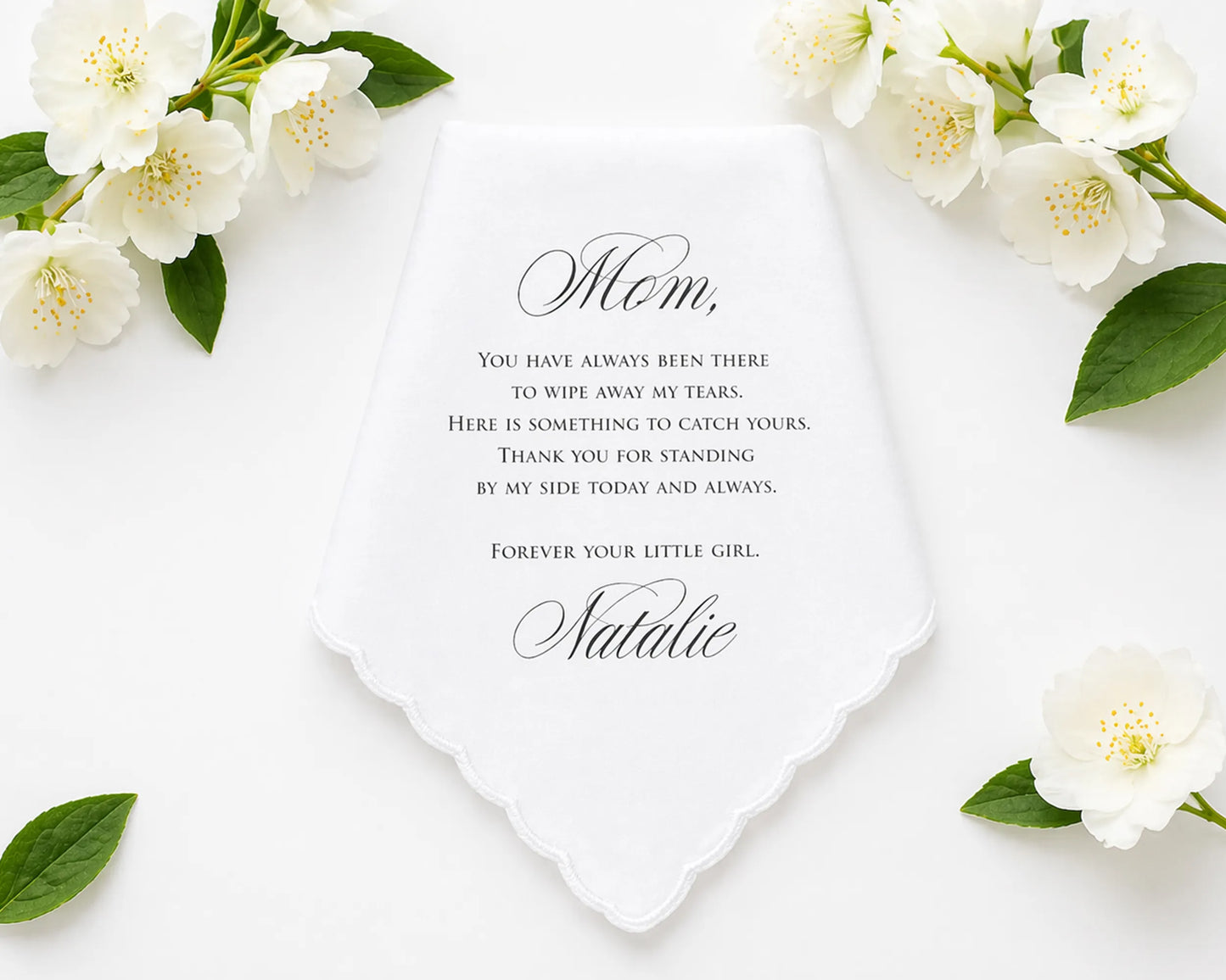 hanky with floral design and heartfelt message to 'Mom' on a white background