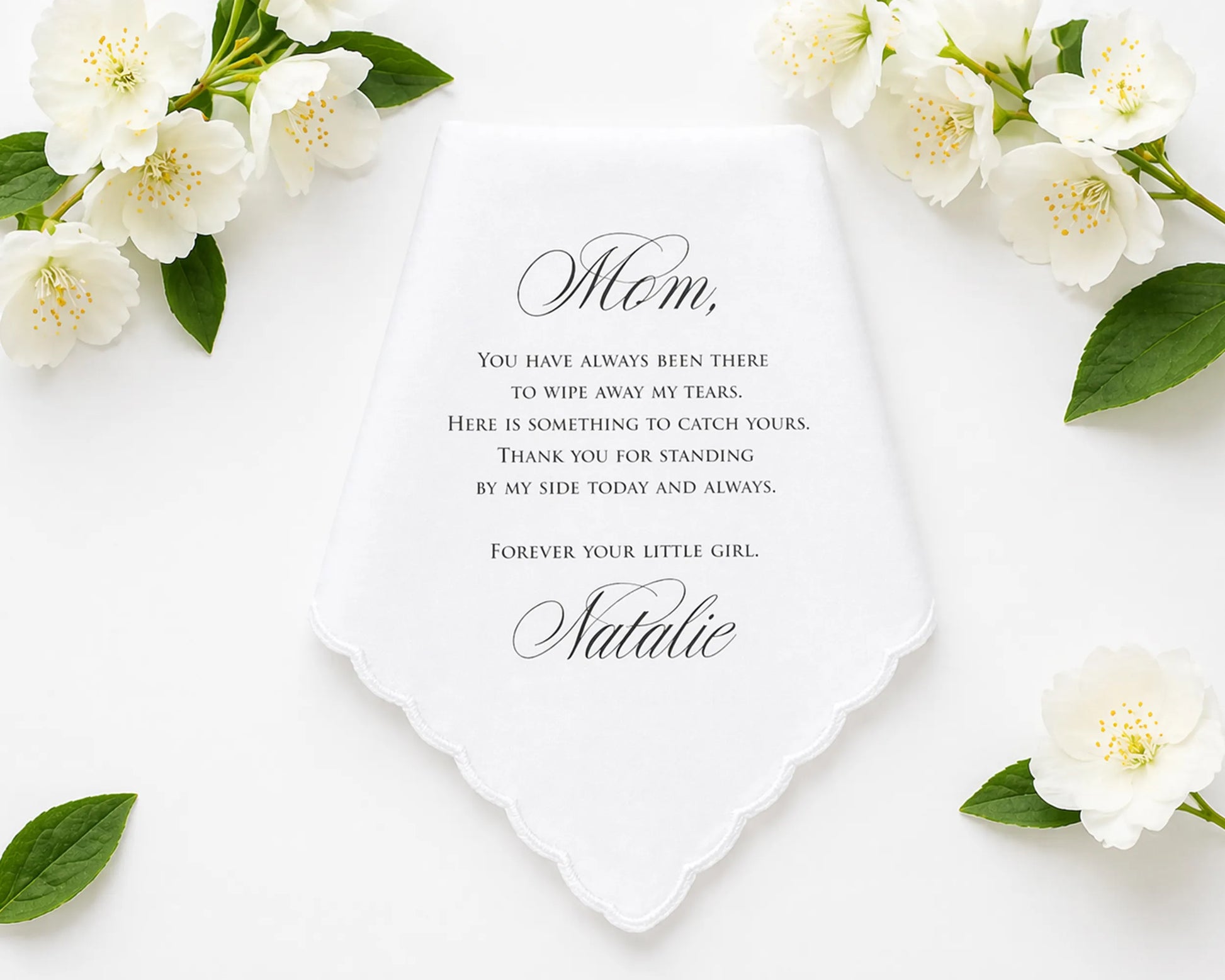 hanky with floral design and heartfelt message to 'Mom' on a white background
