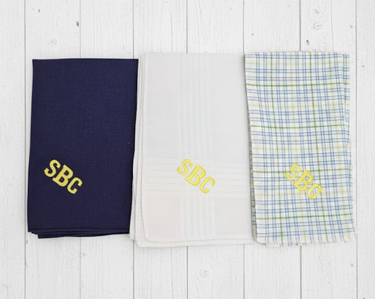 Navy grid solid white and red polka dot cotton pocket squares featuring blue hexagonal monogram embroidery.