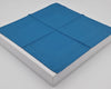 Blue mattress cover on a white mattress against a gray background