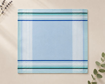 Placemat with blue and green striped pattern on a beige background