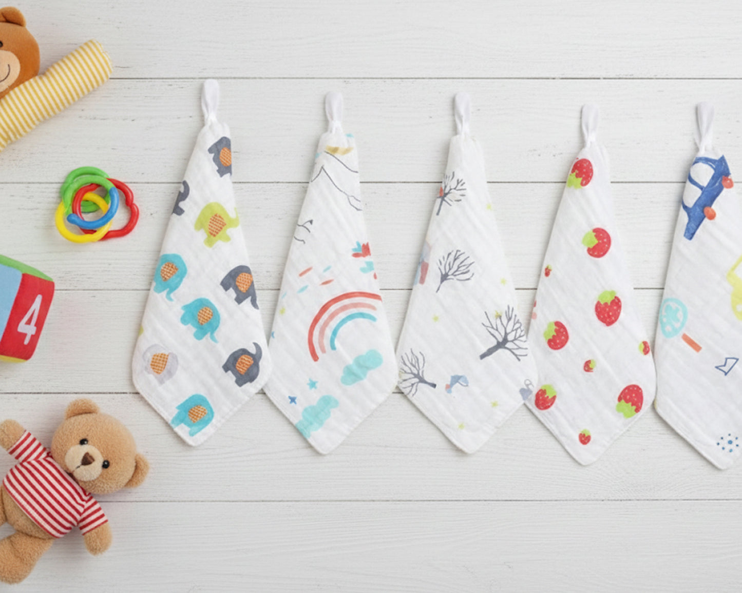 multi pack of white baby towels with car and elephant prints