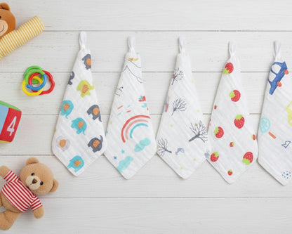 multi pack of white baby towels with car and elephant prints