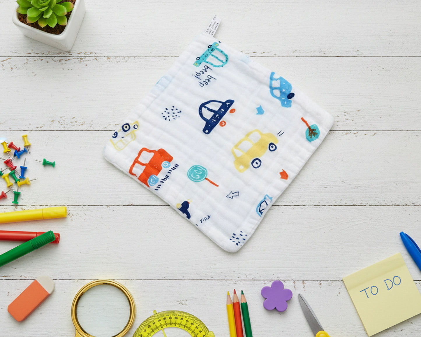 white cotton baby hanky with colorful elephant animal prints