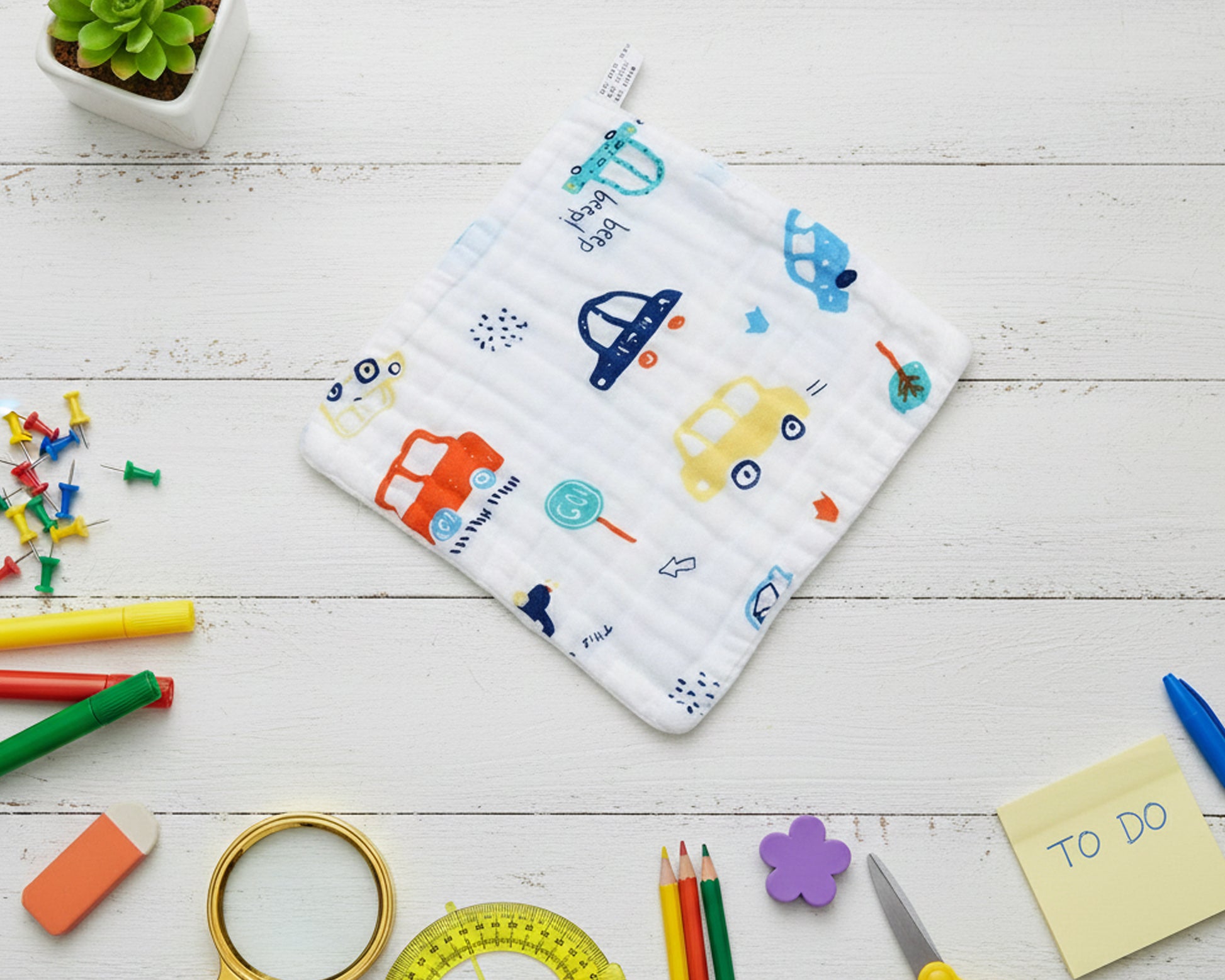 white cotton baby hanky with colorful elephant animal prints