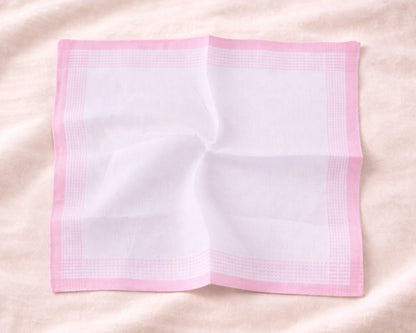 Pink mesh screen on a pink fabric background