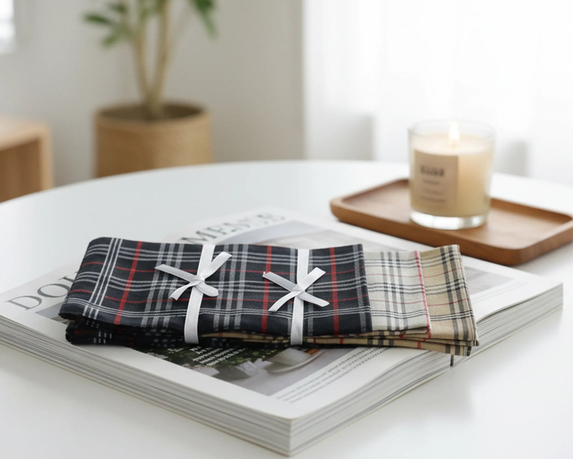 Plaid fabric with white bows on a magazine