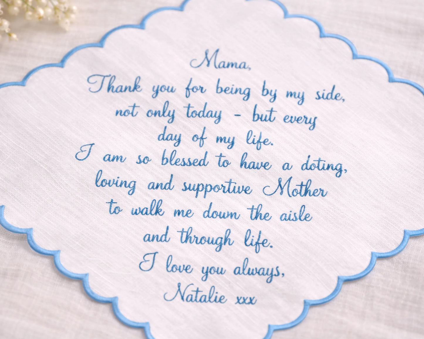 Card with a heartfelt message to a mother on a textured background