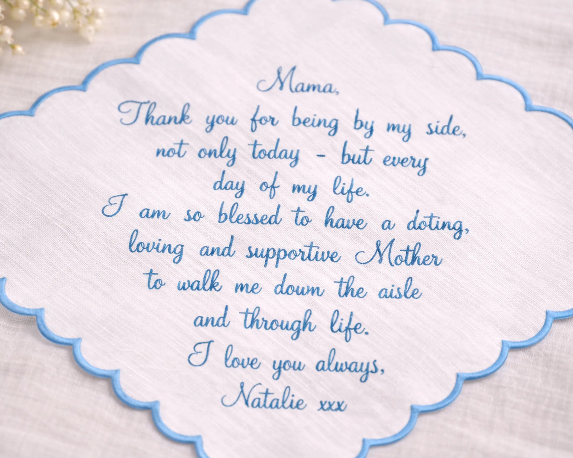 Card with a heartfelt message to a mother on a textured background