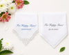 Set of plaid fabric swatches in pink, blue, and white on a marble surface with flowers.