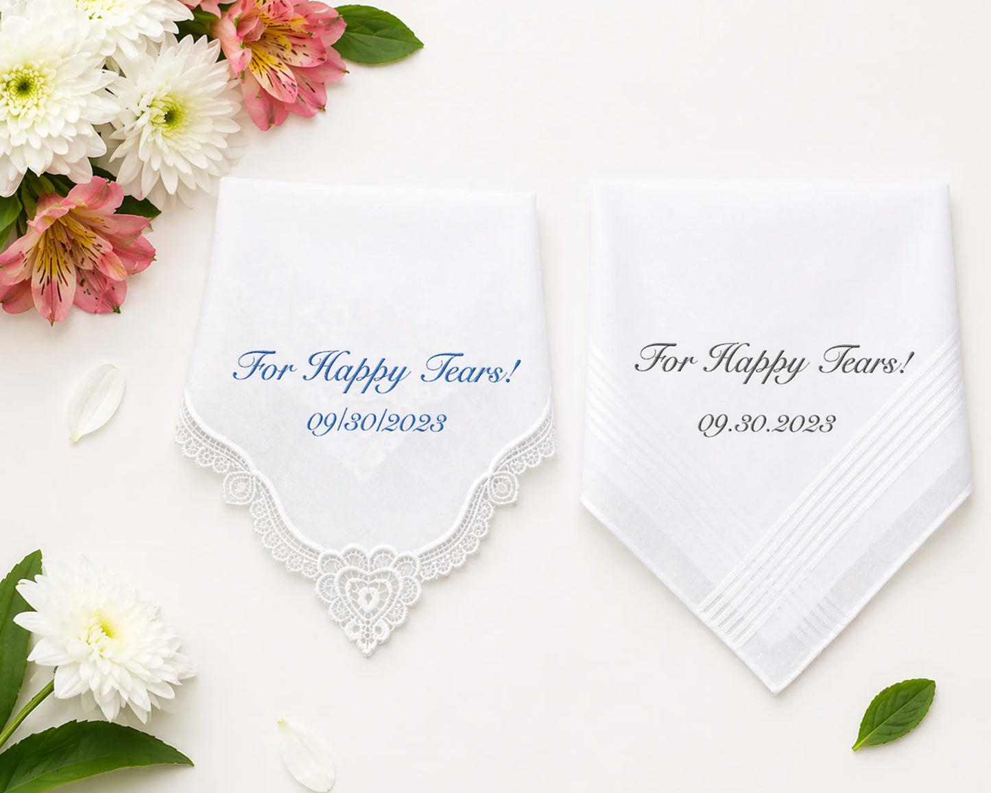 Set of plaid fabric swatches in pink, blue, and white on a marble surface with flowers.