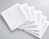 Stack of white hanky on a gray background