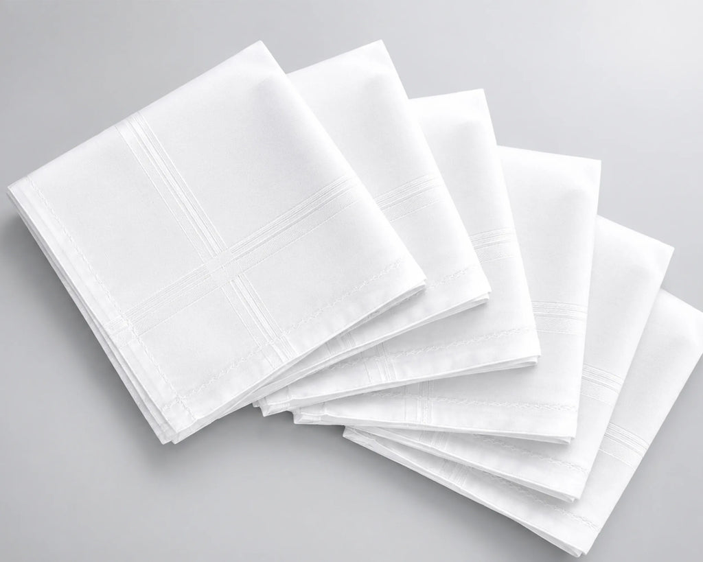 Stack of white hanky on a gray background